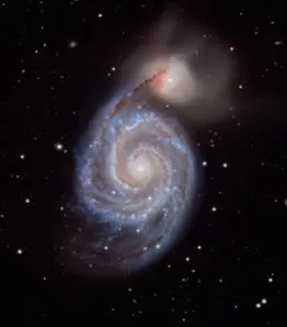 The Whirlpool Galaxy, a spiral galaxy with a companion galaxy