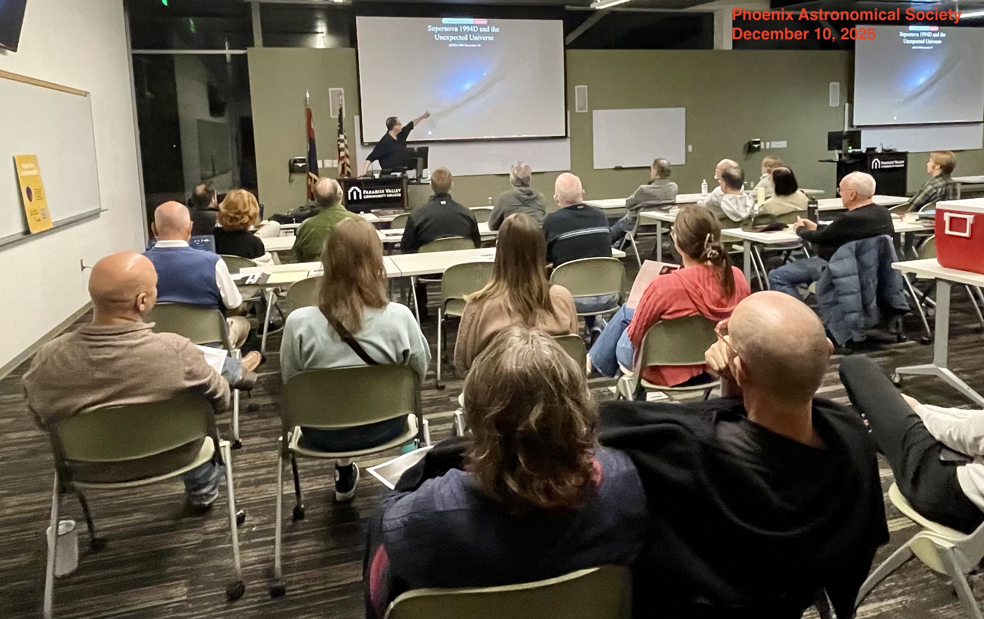 A guest speaker presenting on Supernova 1994D and the Unexpected Universe to a PAS meeting audience